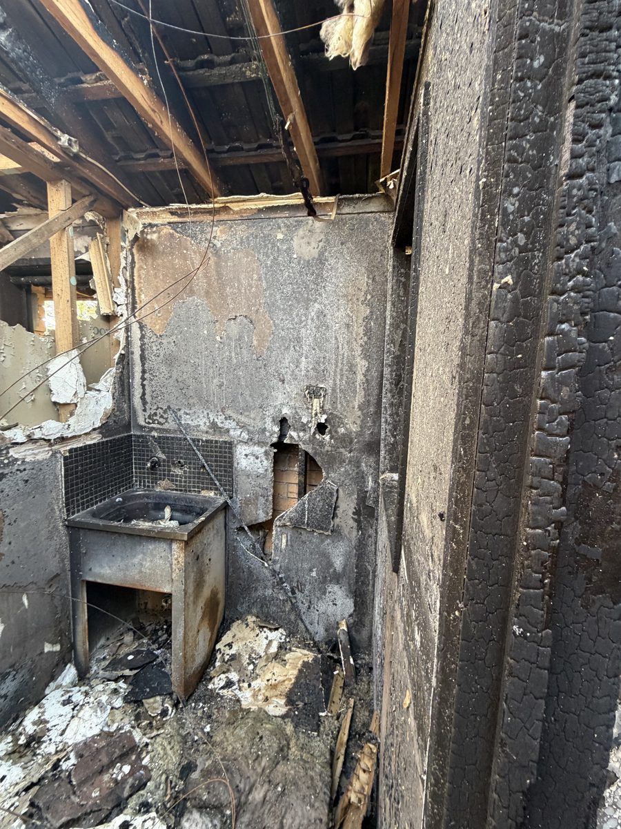 Interior fire damage to kitchen and structure