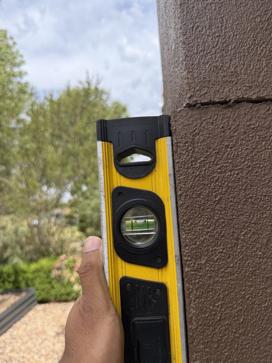 Level assessment of wall rotation and cracking
